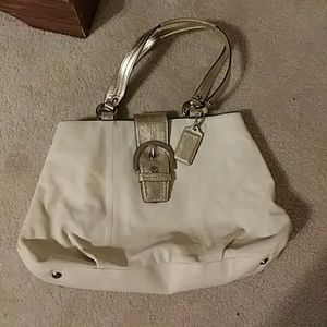 Cream color coach bag